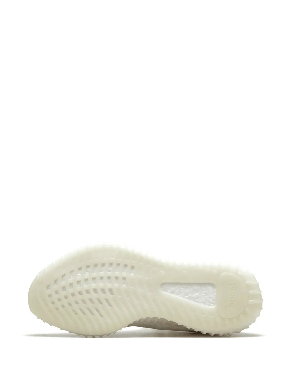 White rubber outsole with circular traction pattern and central stripe detail