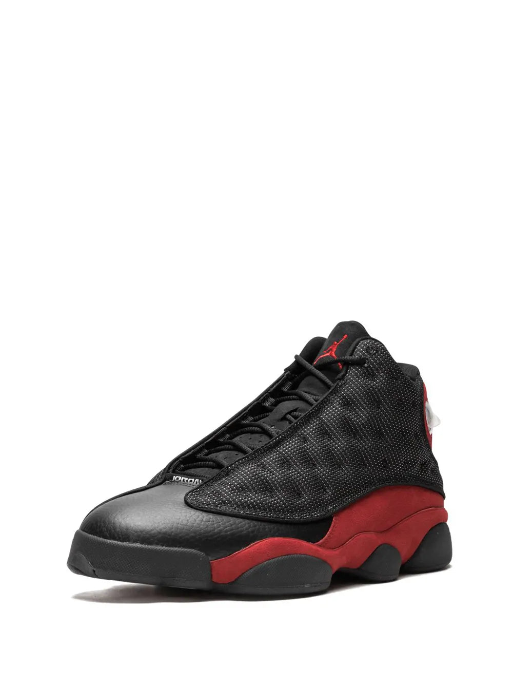 Black lace-up retro sneakers with textured upper, red midsole, and rubber toe cap