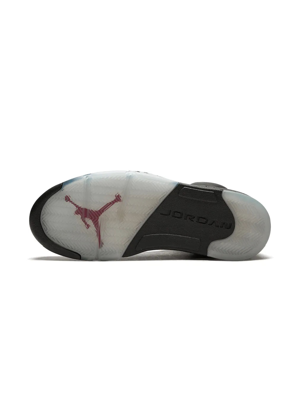 Shoe outsole underside in black and white with red Jumpman logo