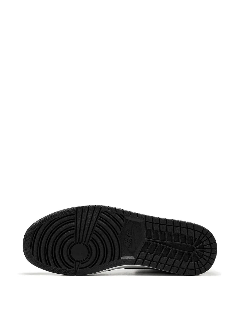 Black rubber sneaker outsole with tread pattern and circular logo