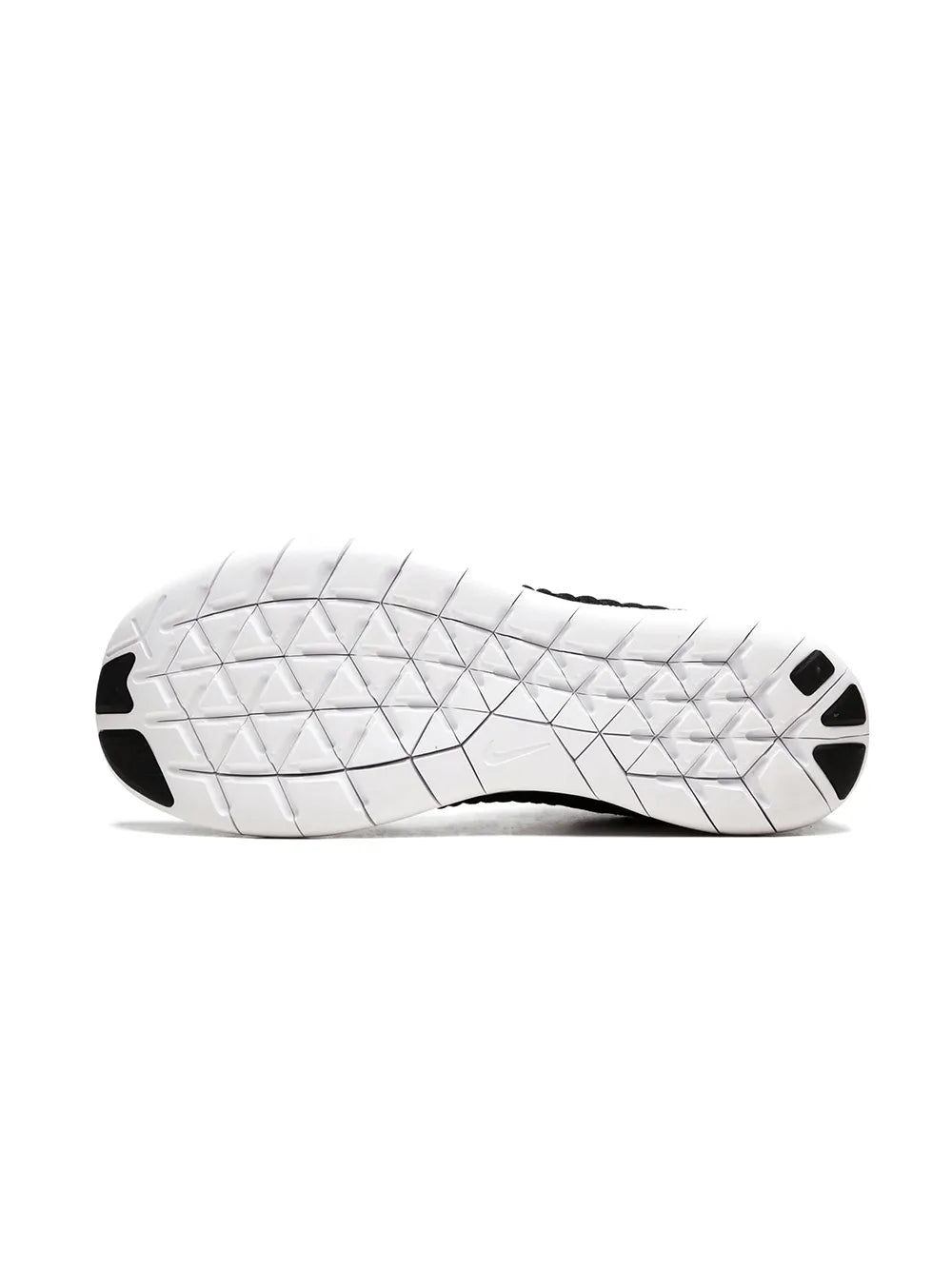 Black and white rubber outsole with textured tread pattern on running shoe
