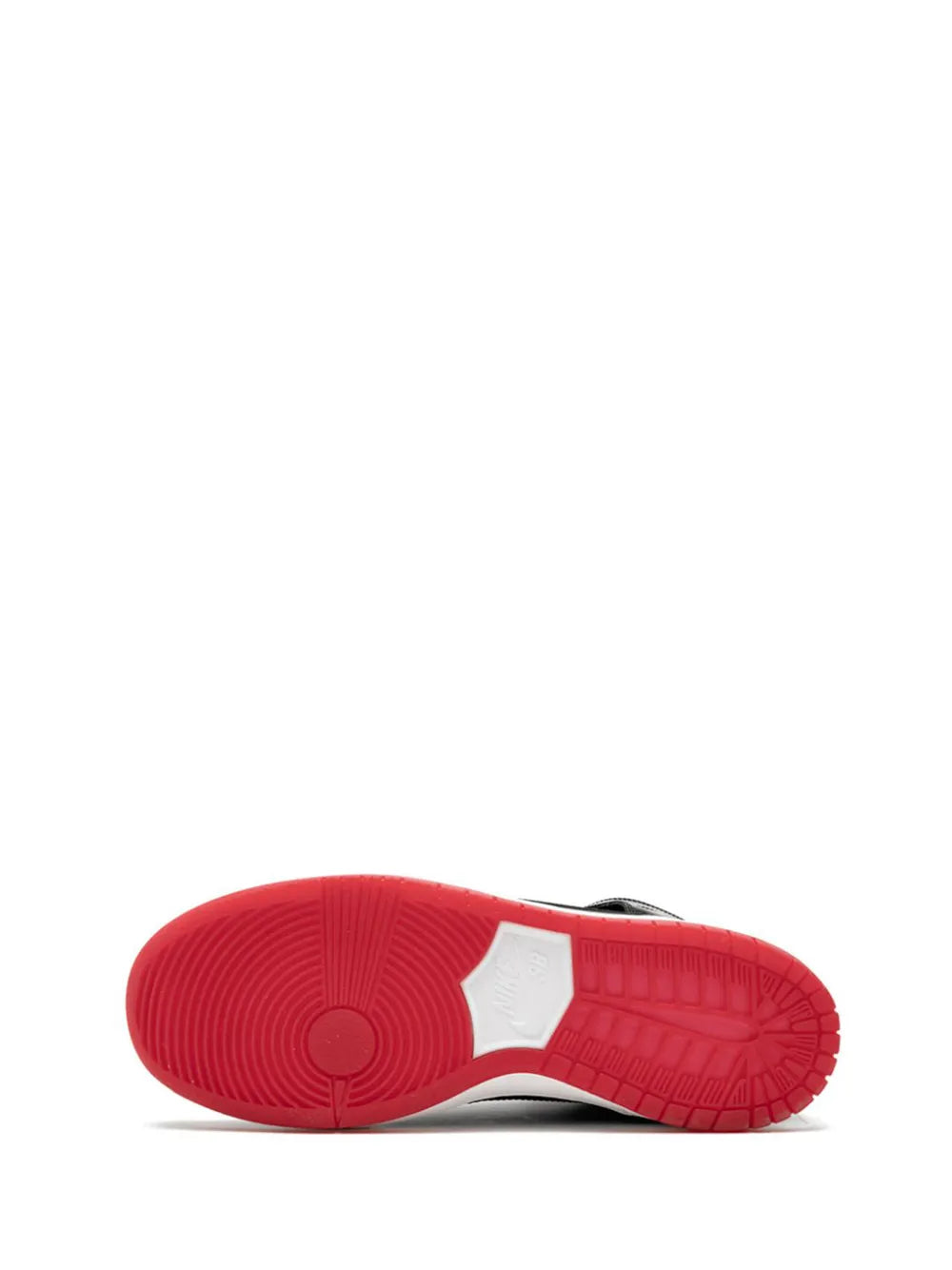 Shoe outsole view with red traction pattern and white midsole edge