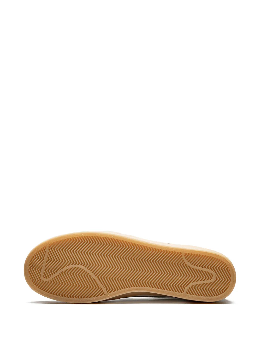 Brown gum rubber outsole with herringbone tread