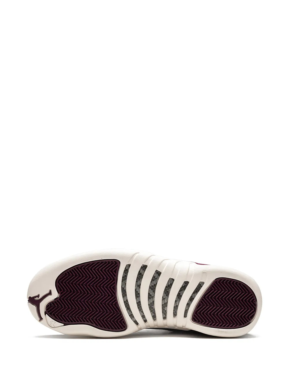 Burgundy mid-top sneaker outsole with white traction tread on bottom
