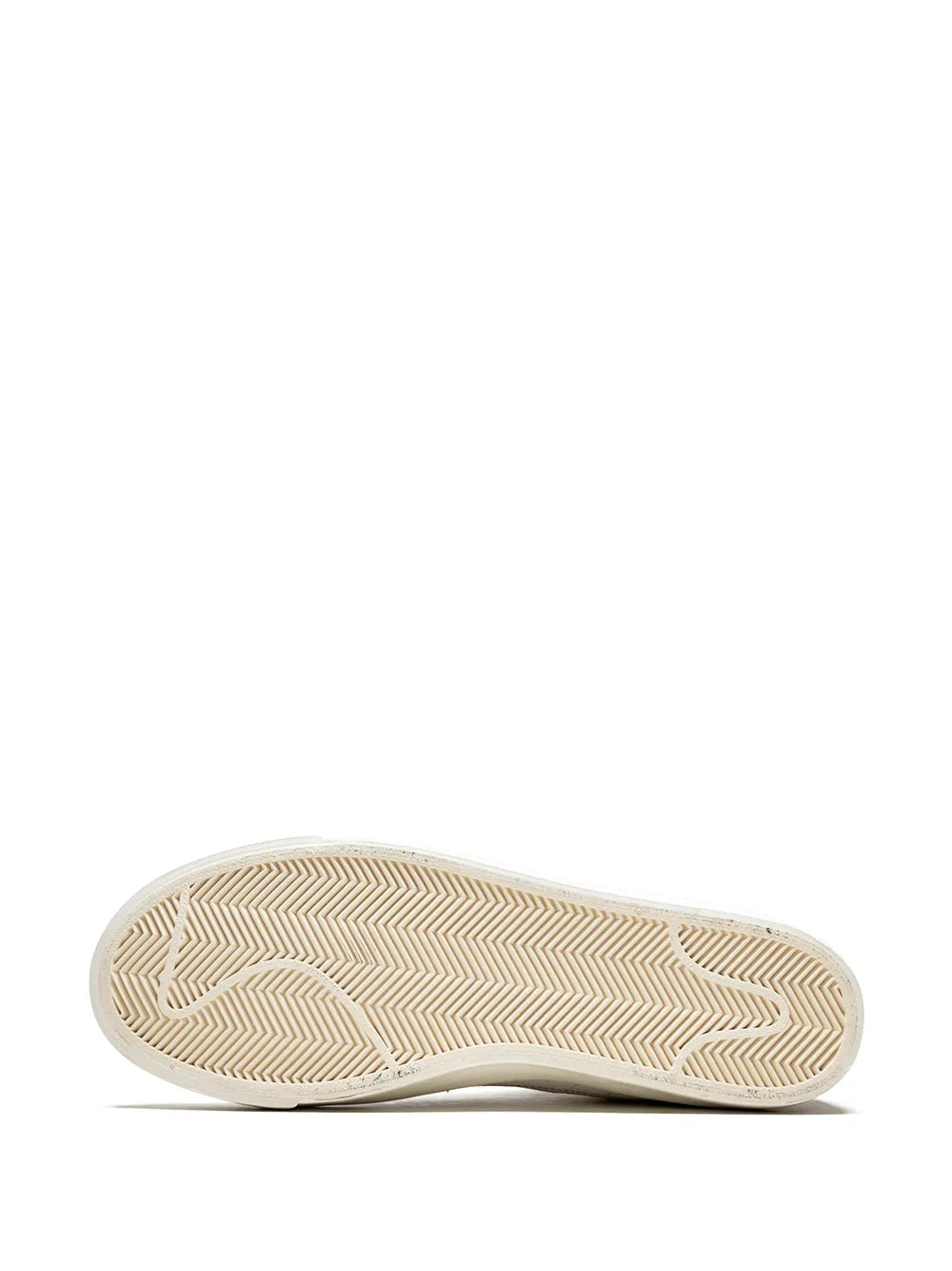 White sneaker outsole with textured zigzag tread