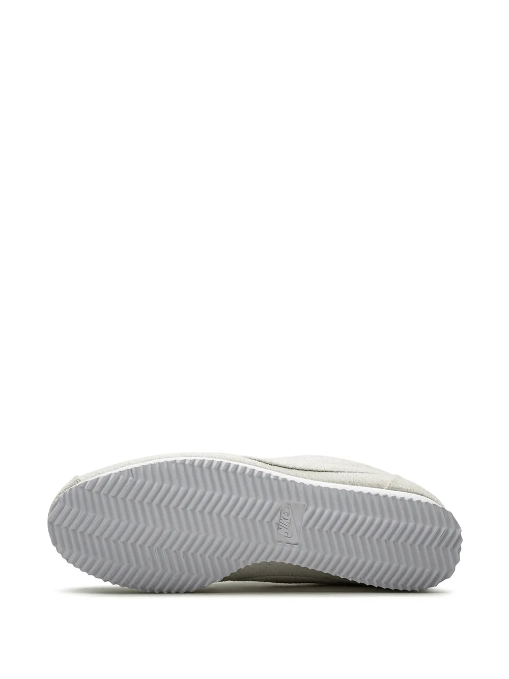 Tan Nike Cortez QS outsole with zigzag tread pattern