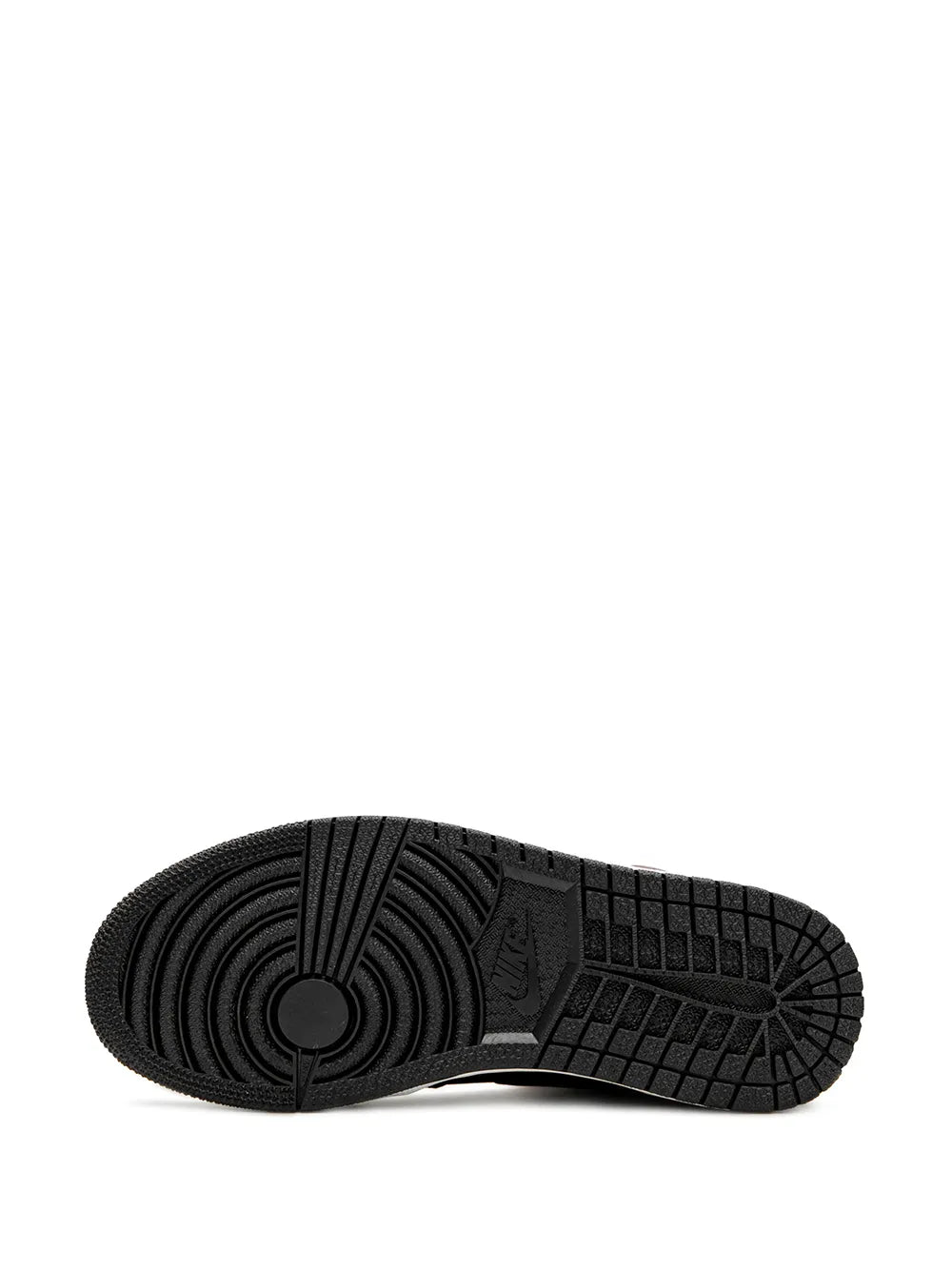 Black sneaker outsole tread with circular pivot pattern and traction grooves