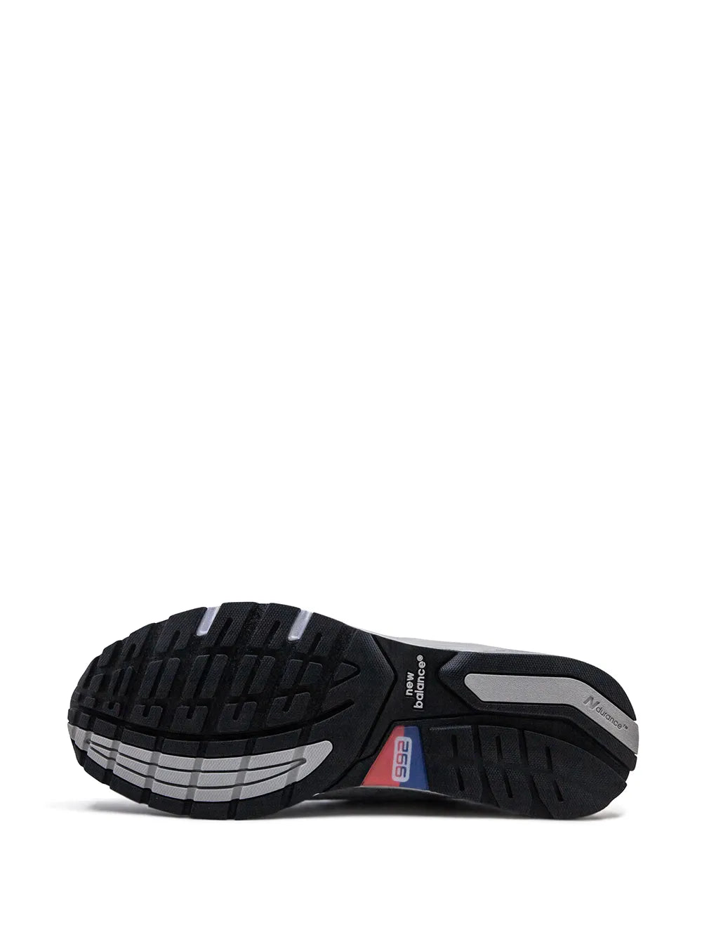 Gray sneaker outsole with deep tread pattern and traction grooves