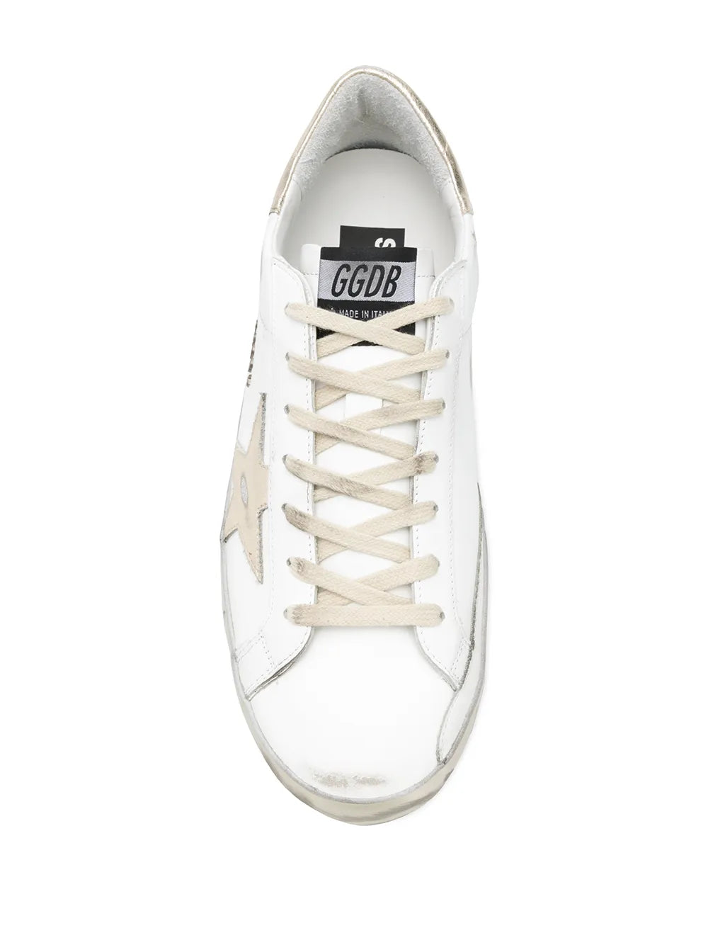 White leather low-top sneaker with lace-up front and visible tongue label