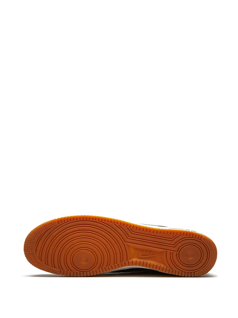 Nike low-top sneakers outsole in gum rubber with circular traction pattern