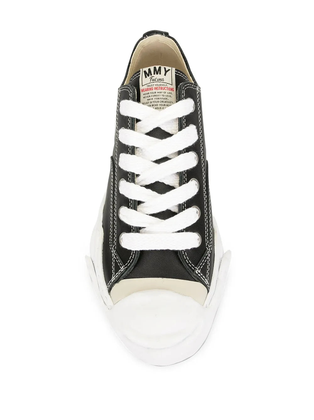Black low-top lace-up sneakers with white laces, white toe cap, and branded tongue