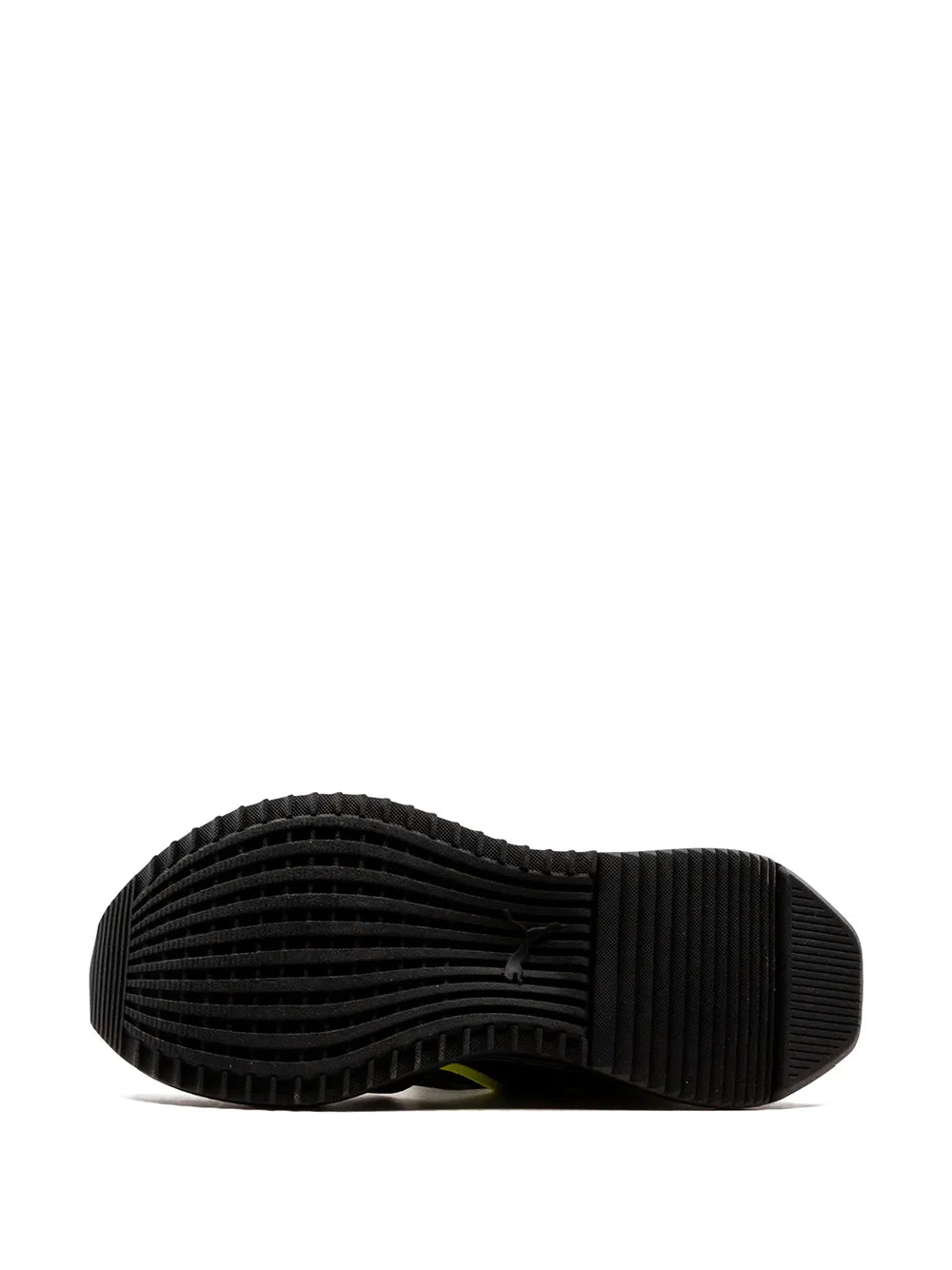 Black sneaker outsole with ridged tread and neon yellow edge detailing