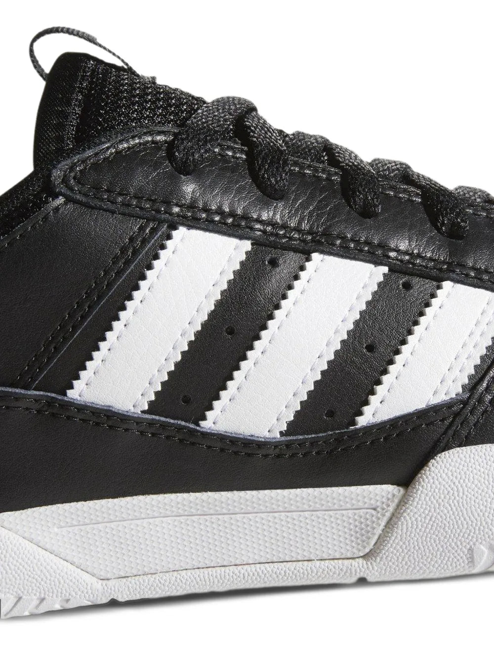 Black leather adidas sneaker upper with white three-stripe detail and stitching.