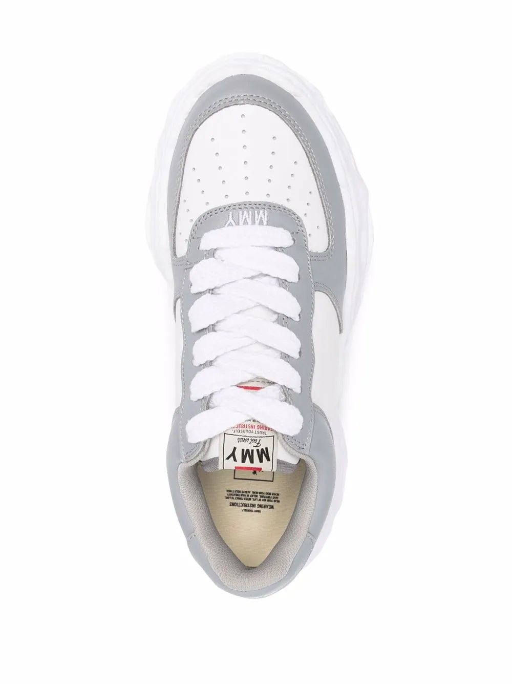 White and light gray chunky sneakers, open view of laces and beige interior label