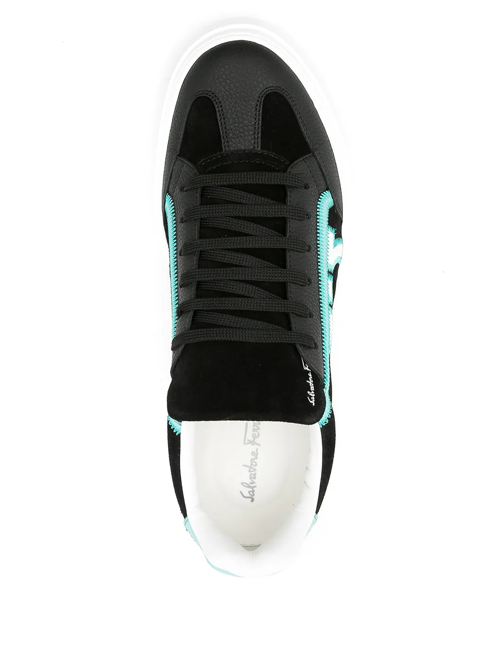 Ferragamo Borg low-top sneakers close-up, black upper with aqua edge stripe and laces