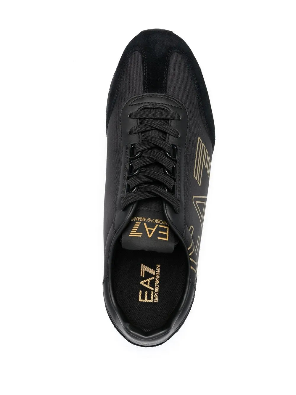 Black low-top sneakers with gold EA logo on tongue and lace-up upper