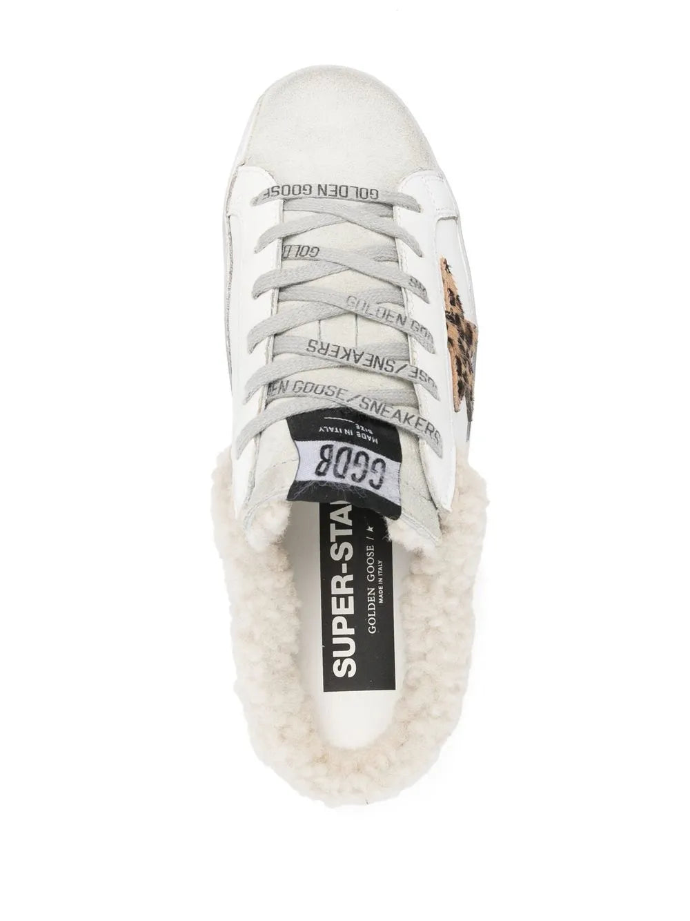 White sneaker with gray laces and Super Star branding on the tongue