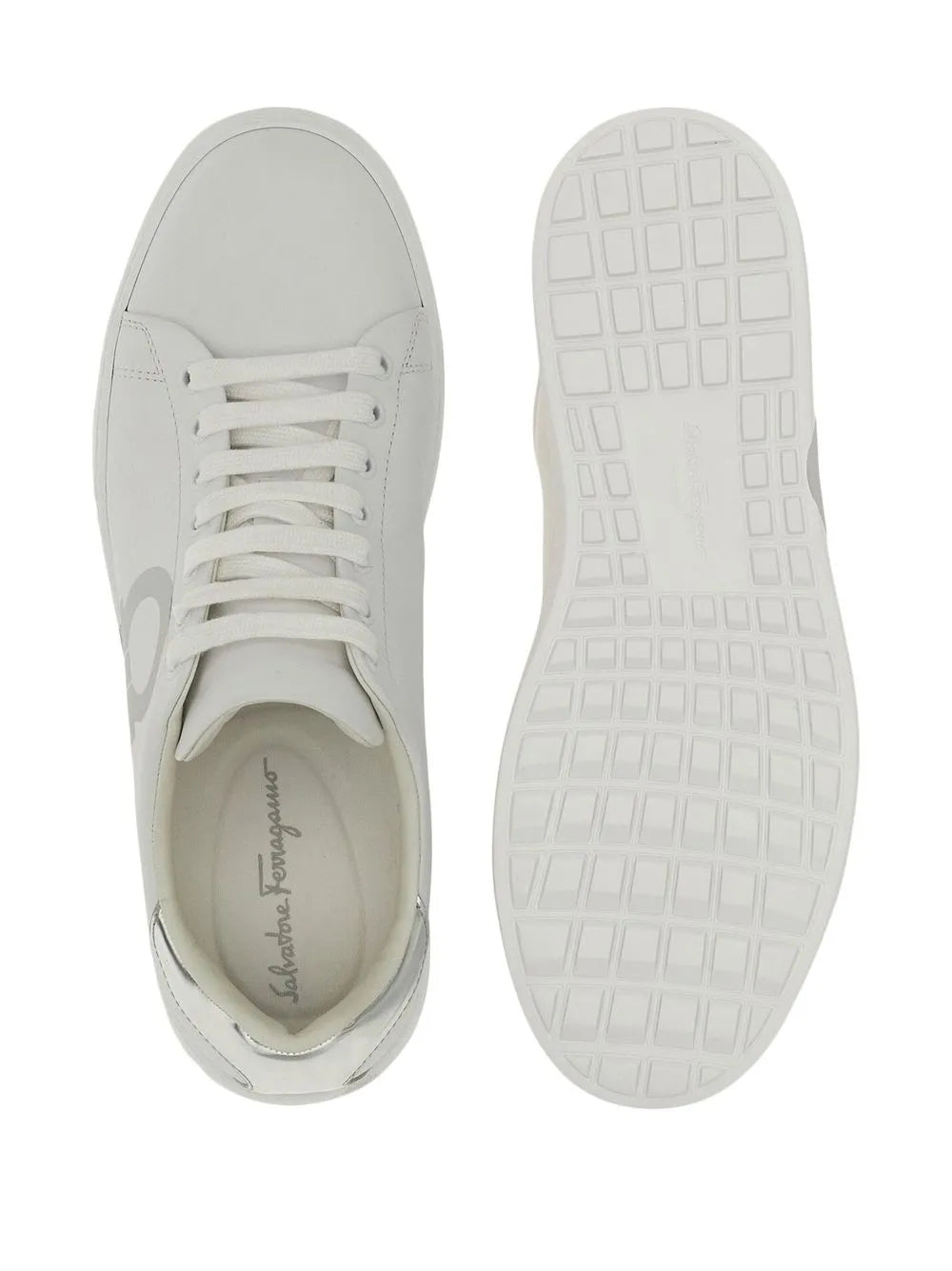 Ferragamo Gancini-print lace-up sneakers, white outsole view with tread pattern
