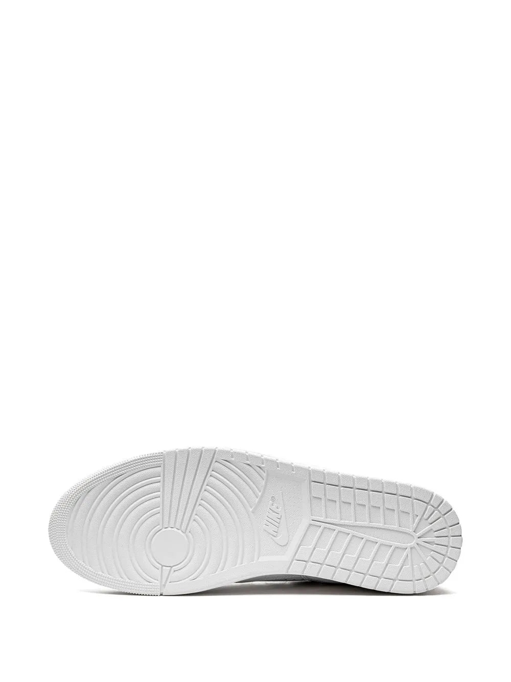 White rubber sneaker outsole with tread pattern