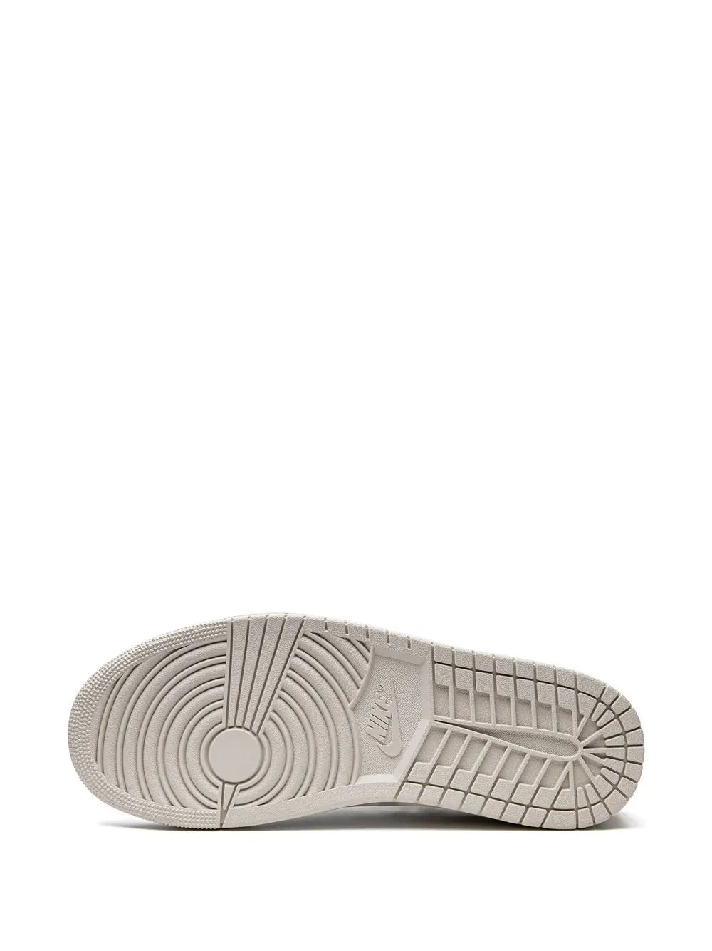 White rubber sneaker outsole with traction grooves