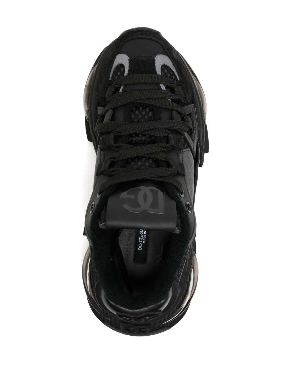 Black lace-up sneaker top view with padded collar and metal eyelets