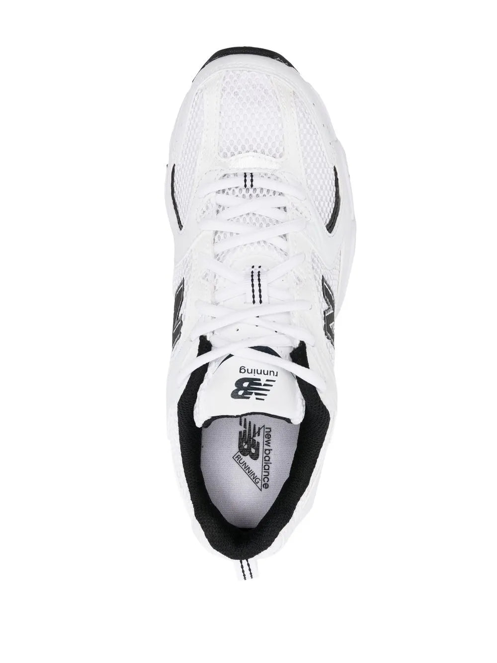 White low-top sneaker with lace-up front, tongue label, black heel collar