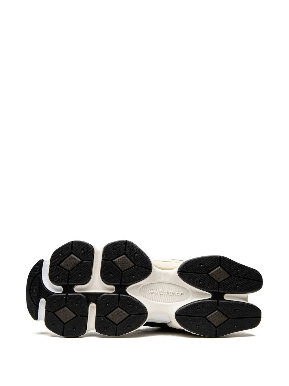New Balance 9060 sneaker outsole, hex tread pattern on black and cream sole