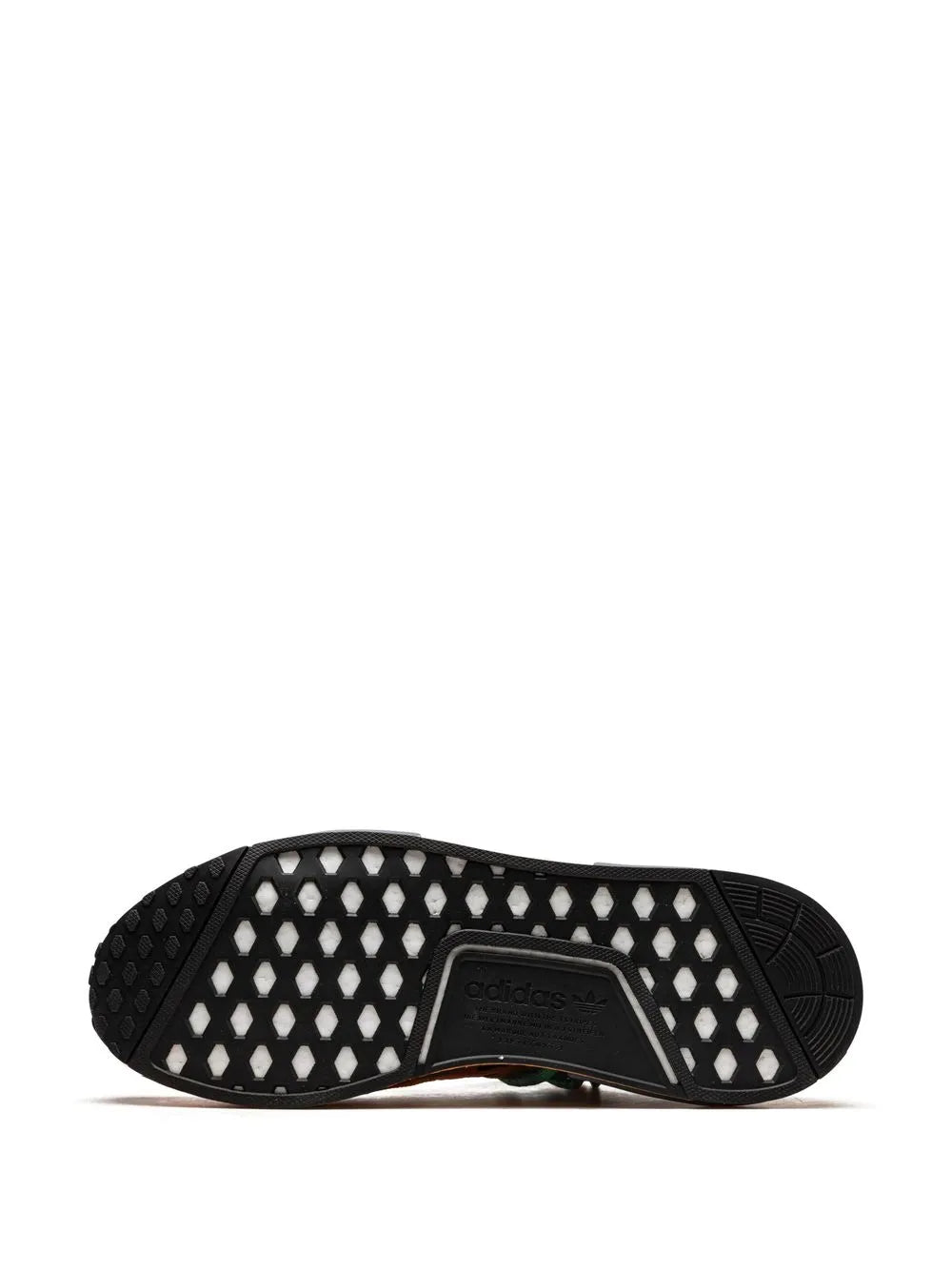 Black rubber outsole with tread pattern and adidas logo on heel