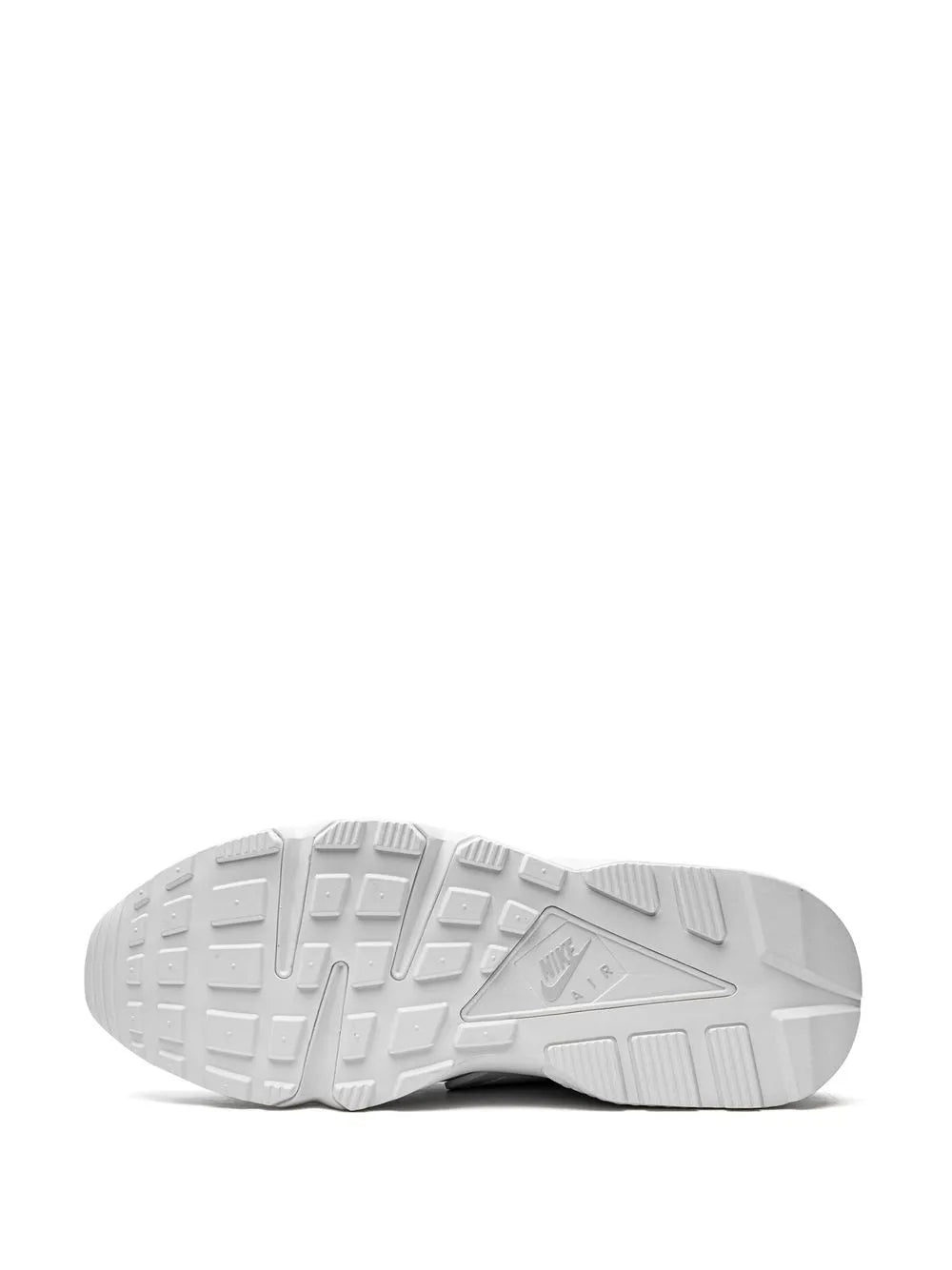 Nike Air Huarache white rubber outsole with tread pattern and brand mark