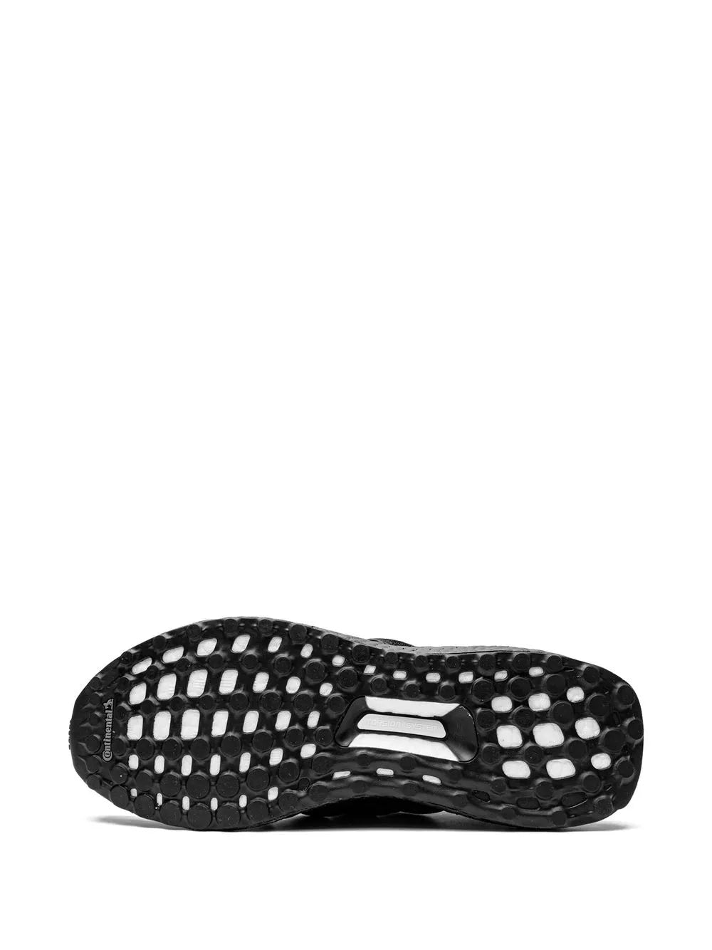 Black adidas leather shoe outsole tread with circular grip pattern