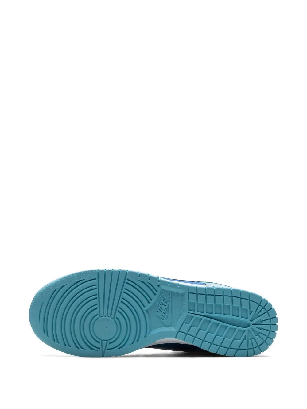 Light blue rubber outsole with traction grooves on low-top sneaker
