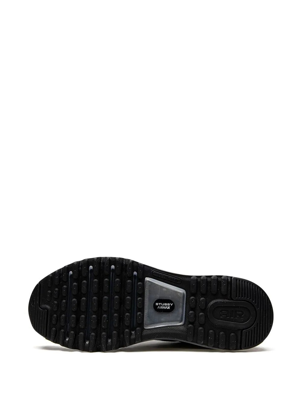 Black sneaker outsole with rubber traction tread and Air unit window