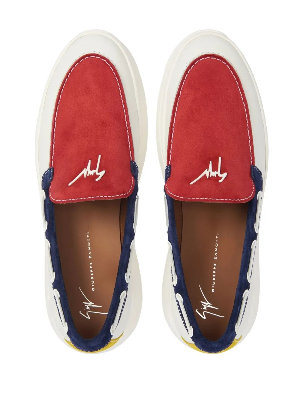 Color-block slip-on sneakers: red suede uppers, navy trim, white outsole