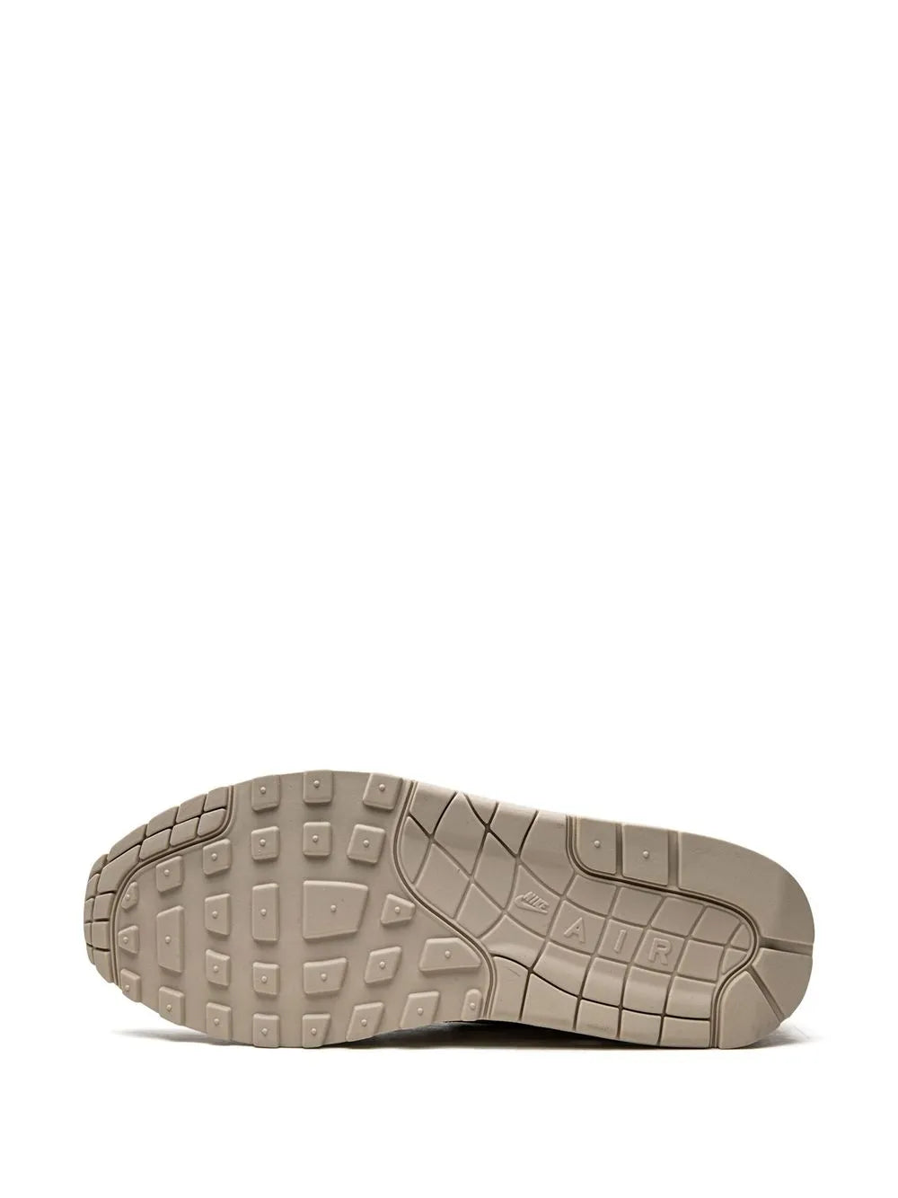 Off-white sneaker outsole with traction tread and Air Max branding