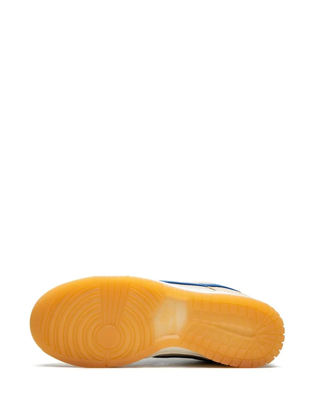 Gum rubber outsole with circular tread pattern for low-top sneakers