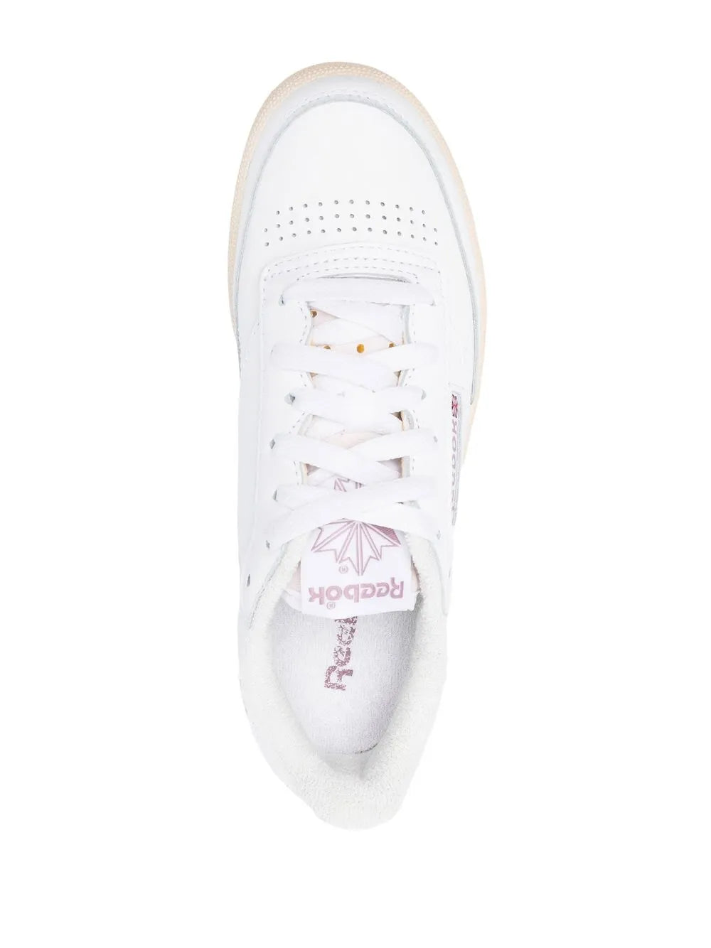White Reebok leather low-top sneaker interior view with logo on insole