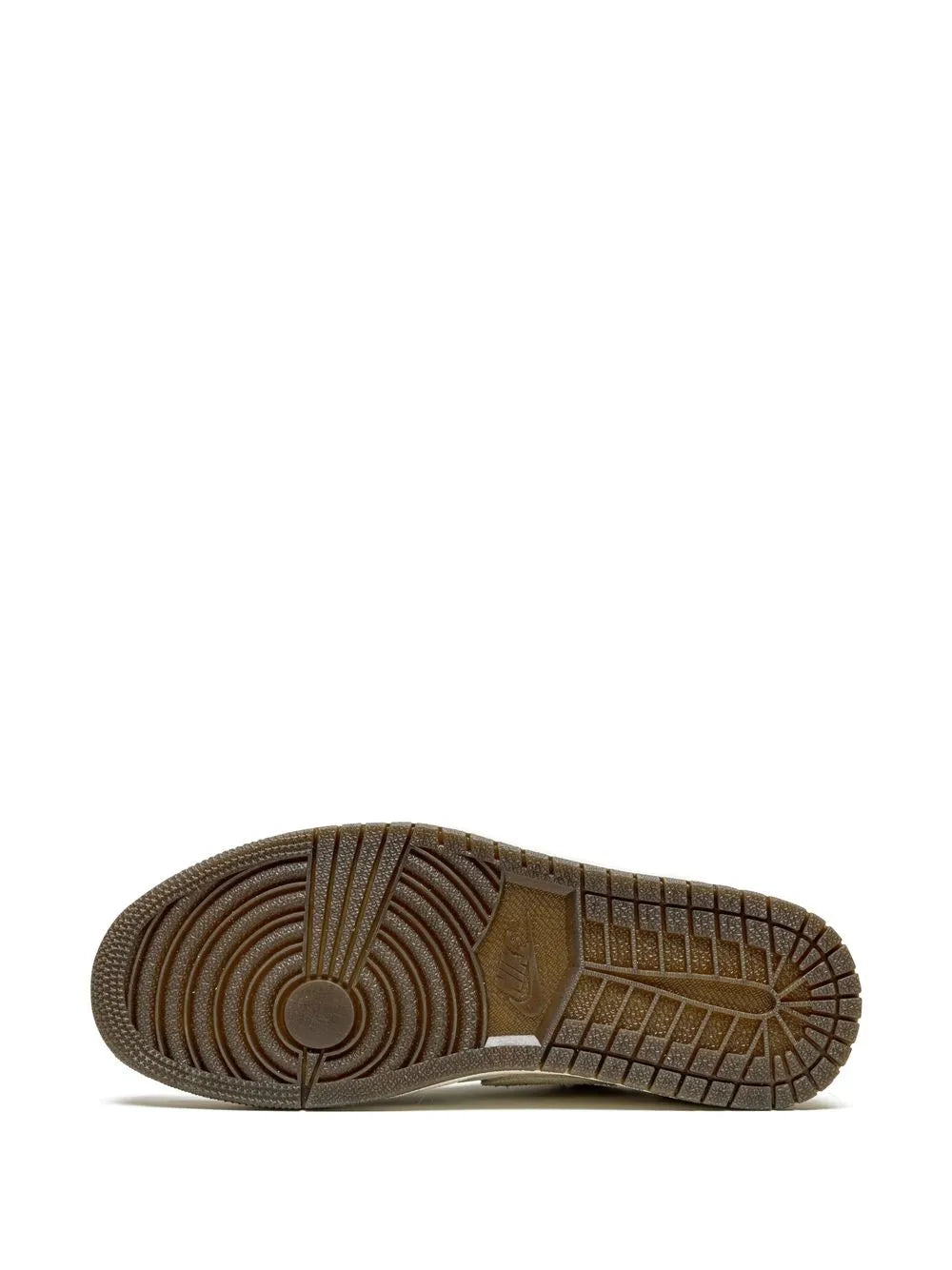 Rubber outsole with textured tread and circular traction pattern
