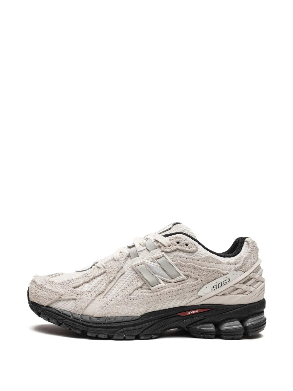 New Balance 1906R sneakers in light gray with lace-up front and black cushioning midsole
