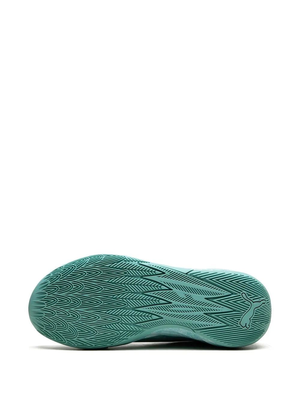 Teal PUMA basketball shoe outsole with textured tread pattern