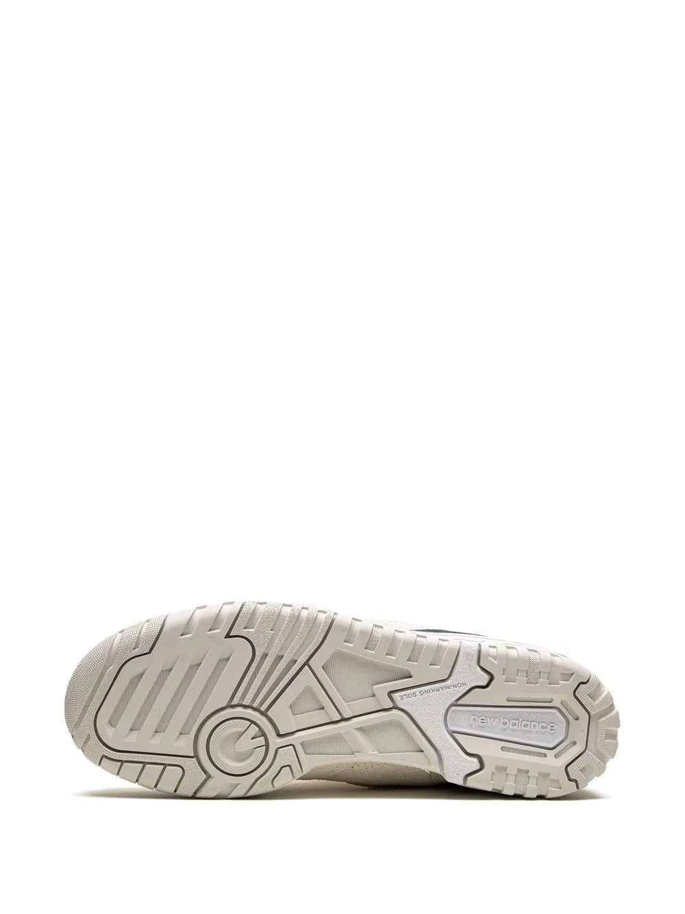 New Balance low-top sneaker outsole view with treaded rubber, cream and gray.