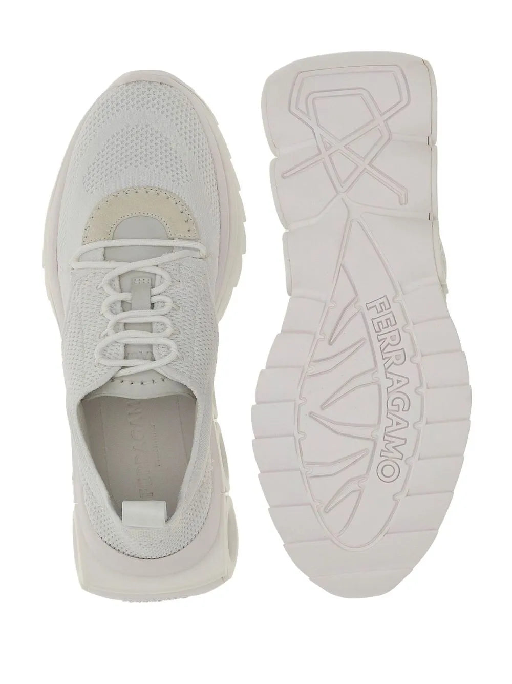 Ferragamo knitted running sneakers, optical white with outsole tread showing Ferragamo lettering