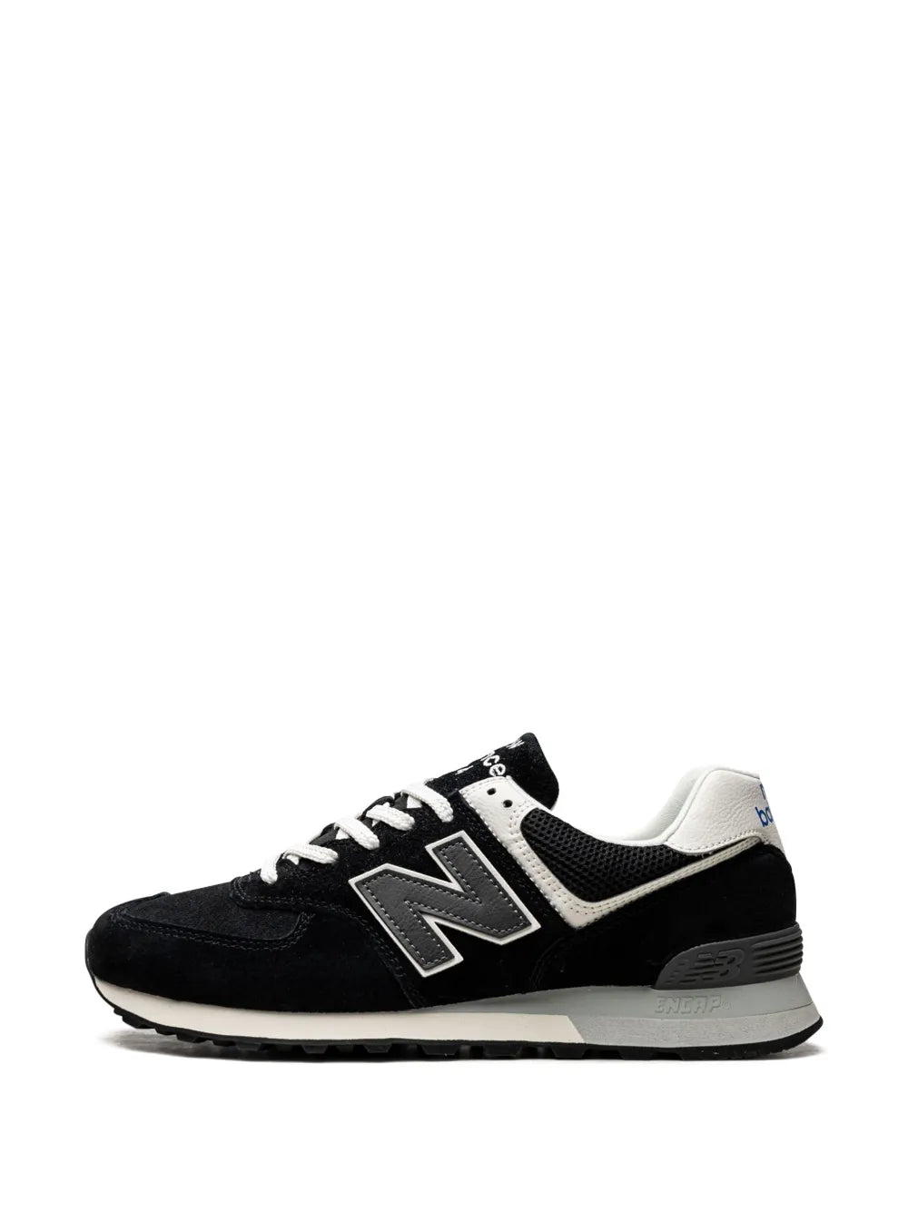 Black New Balance 574 sneakers with white N logo, lace-up front, and light sole