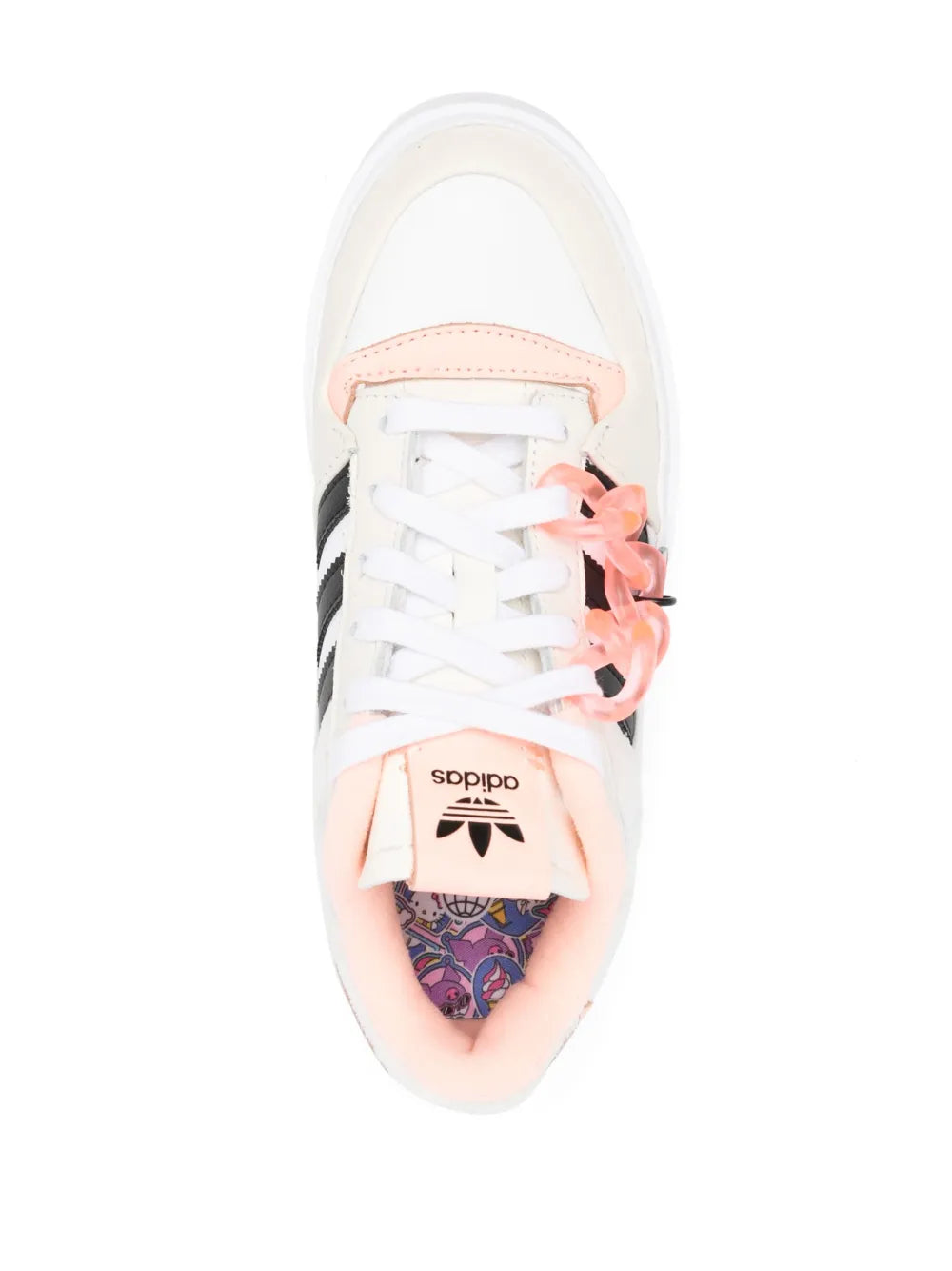 White low-top sneakers with pink lining, lace-up front, and tongue tag.