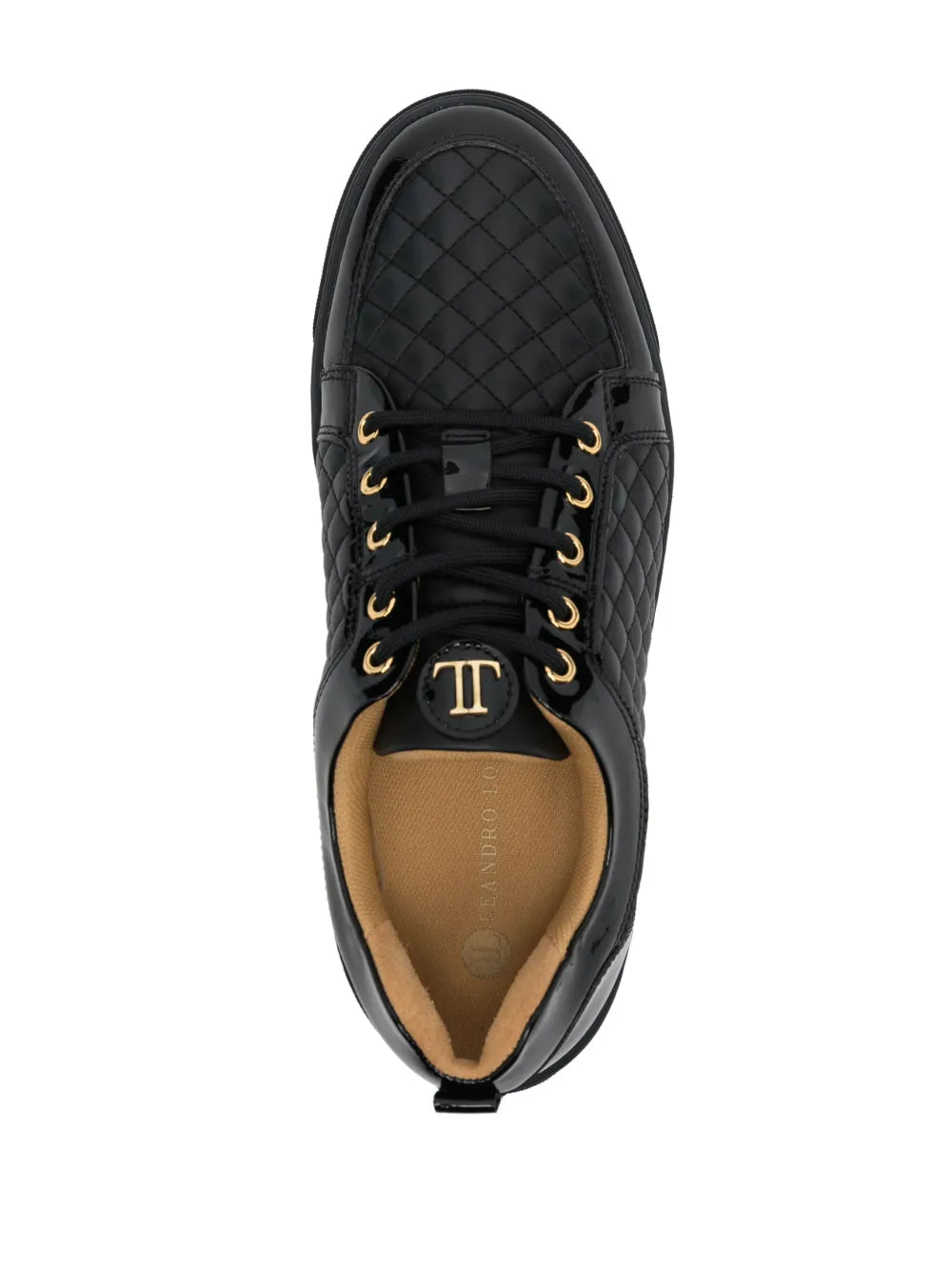 Black quilted lace-up low-top sneakers with tan lining and gold eyelets