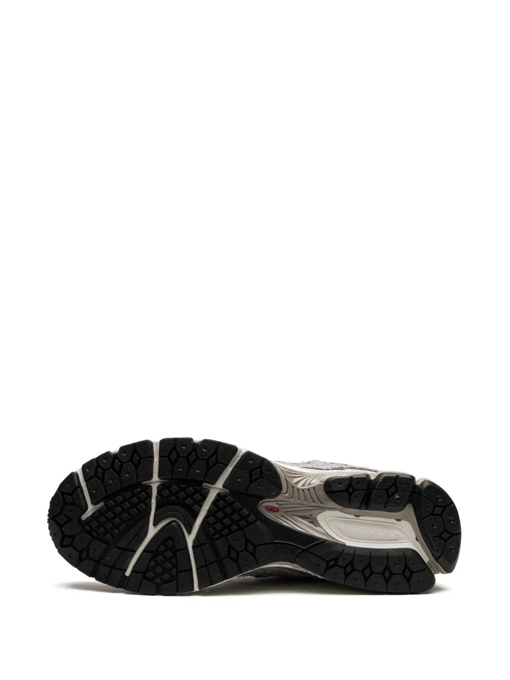 New Balance 2002R outsole view with black traction tread and grey midsole