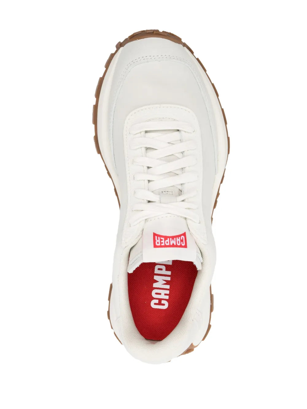 White low-top sneakers with red interior lining and CAMPER logo on tongue