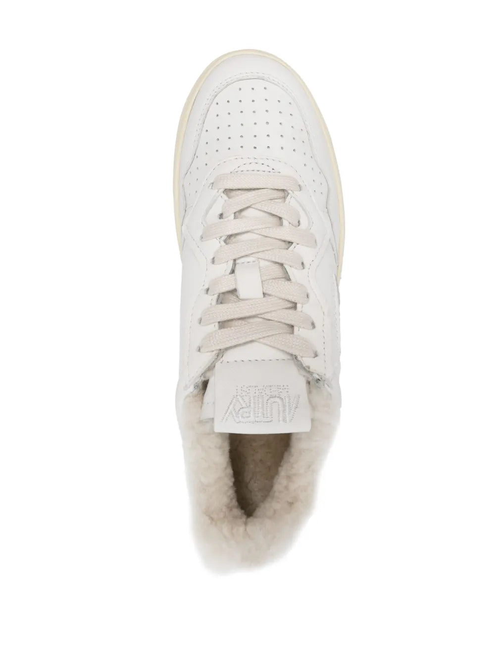 Autry white low-top sneaker tongue and laces, plush shearling lining