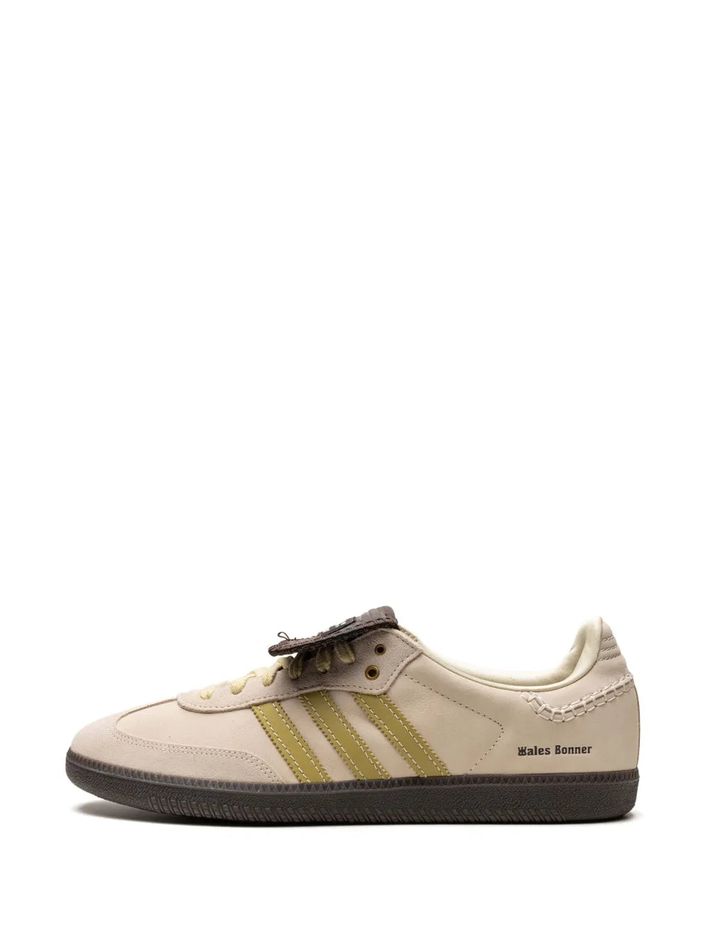 Beige low-top sneakers with green triple stripes and lace-up closure
