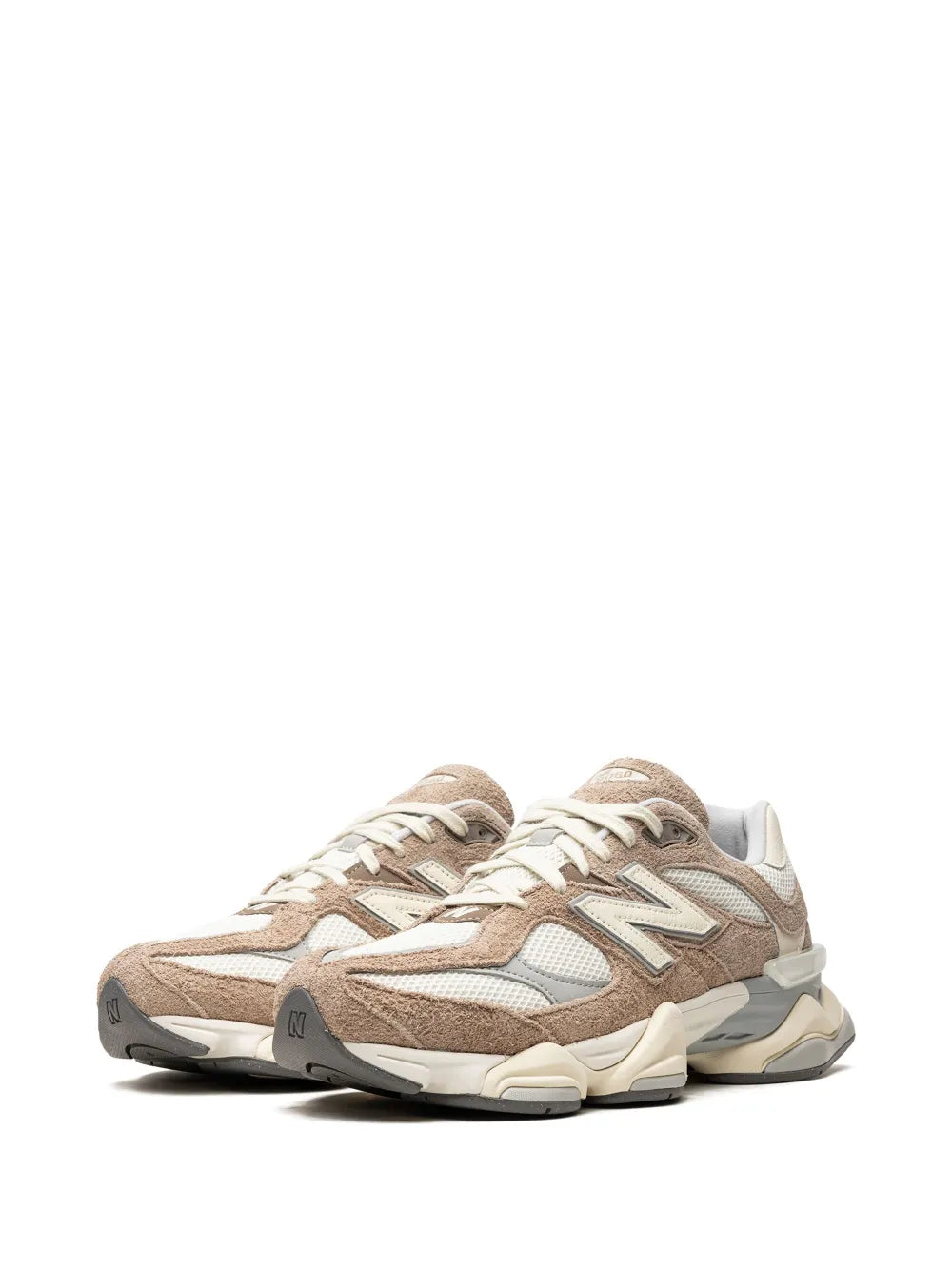Beige and white lace-up sneaker pair with N logo and thick midsole.