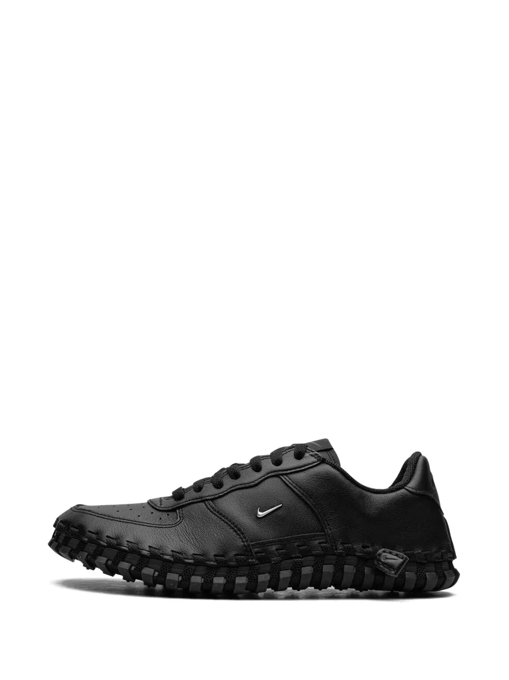 Black low-top lace-up sneaker with Swoosh and chunky rubber tread sole
